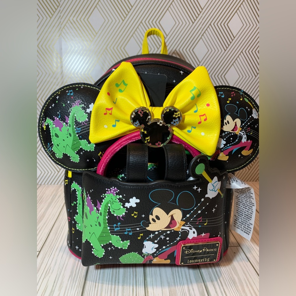 Brand new Disney Main Street Electrical Parade Loungefly backpack and ears